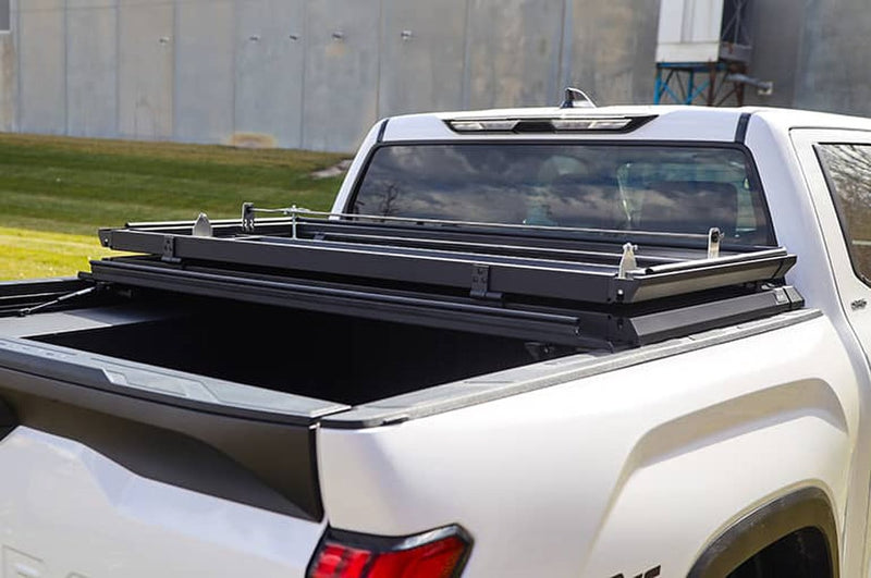 Load image into Gallery viewer, Ford F-150 DeeZee Black Guardian Hard Folding Tonneau Cover for 2015 to 2025
