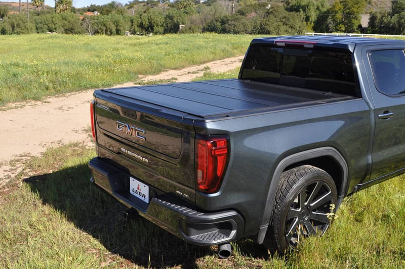 Load image into Gallery viewer, Ford F-150 Leer Black Hard Folding Tonneau Cover for 2015 to 2025
